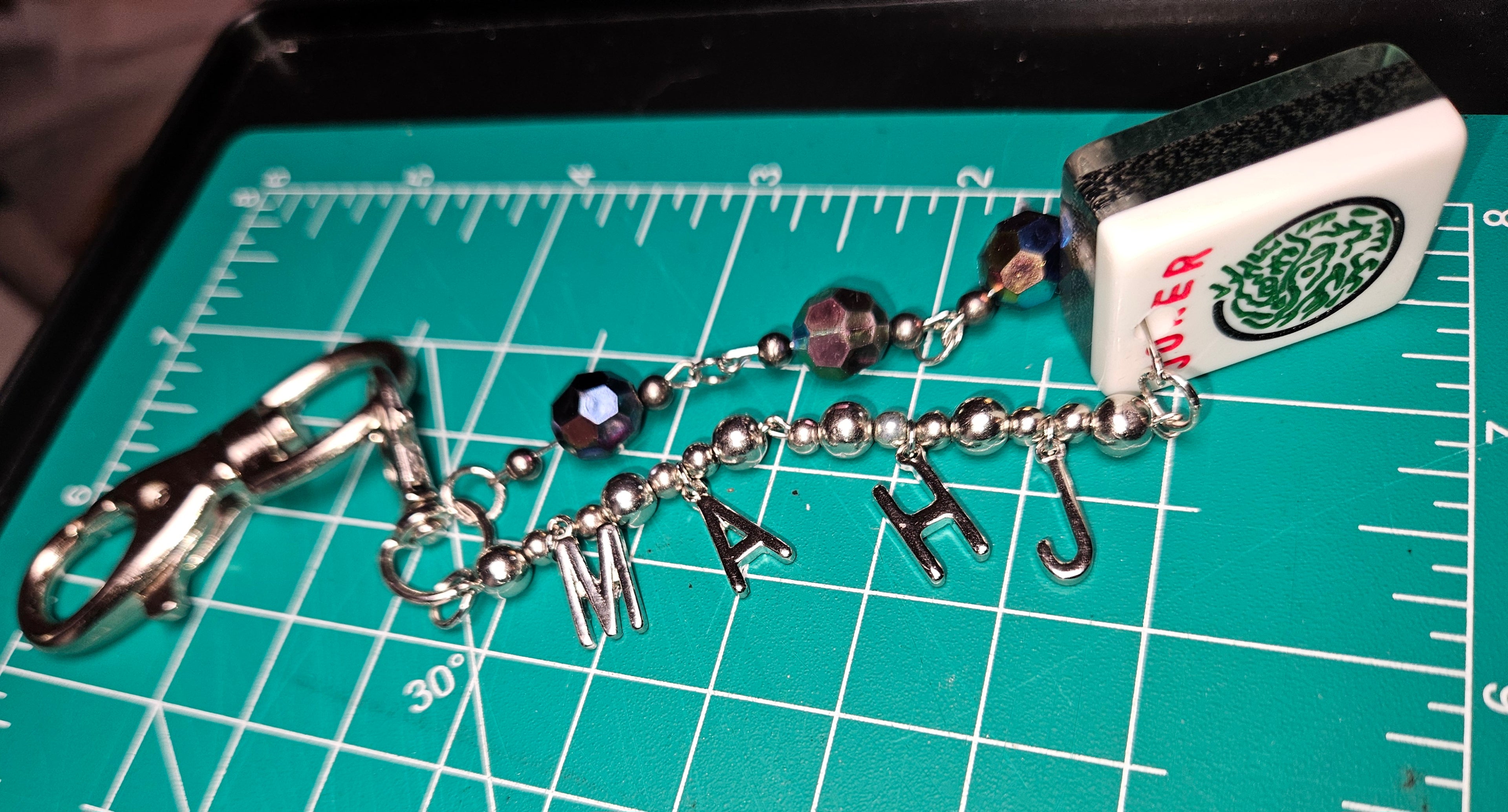 M A H J Joker Tile Keychain with added black sparkle beads (Tile is black silver glitter.)
